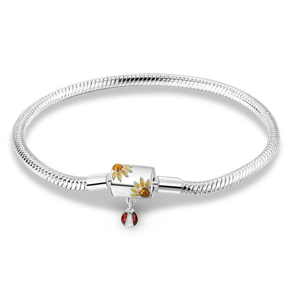 Floral Charm Bracelet with Ladybug Pendant and Elegant Snake Chain - Sunflower delight charm sterling silver snake chain bracelet with yellow enamel and ladybug charm