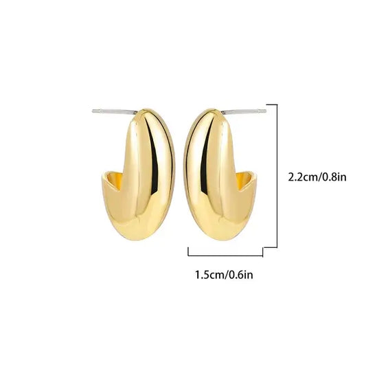 Classic gold oval hoop earbands measuband .cm in height and .cm in width.