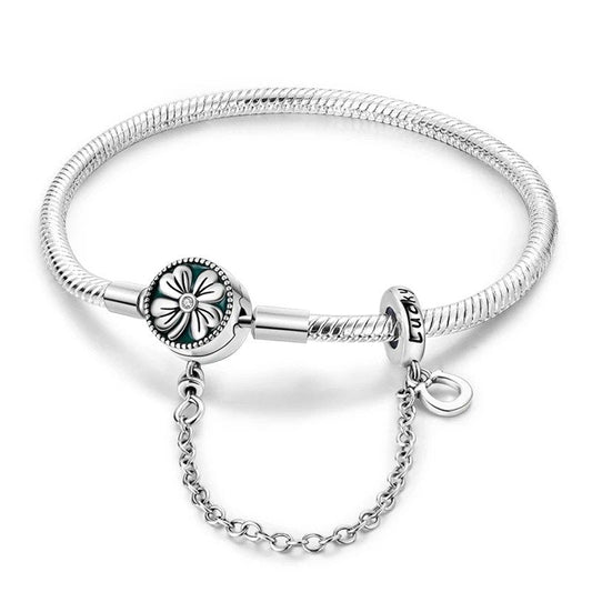 Delicate Daisy Charm Silver Bracelet with daisy charm.