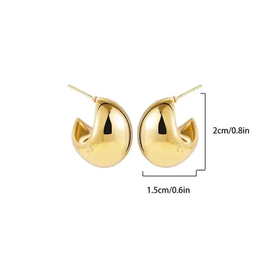 Elegant gold half hoop earbands measuband cm in height and .cm in width.