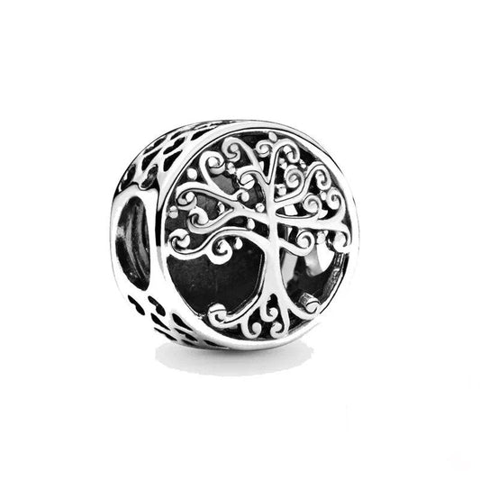 Silver charm with intricate Tree of Life design, fitting Pandora bracelets