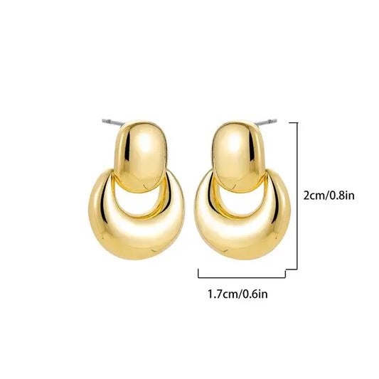 Double hoop gold earrings measuring cm in height and .cm in width, displayed with dimensions.