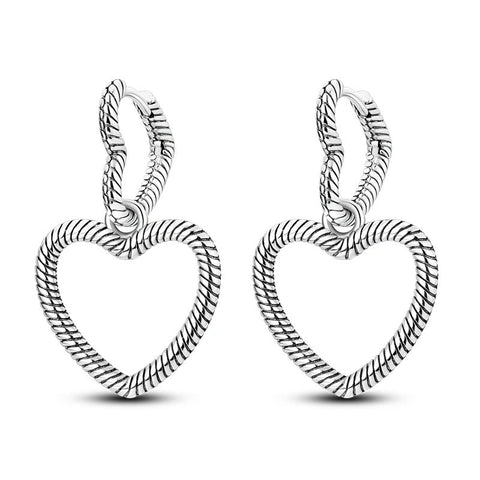 Elegant Sterling Silver Heart Shaped Hoop Earrings - Sterling silver heart-shaped hoop earrings with detailed design.