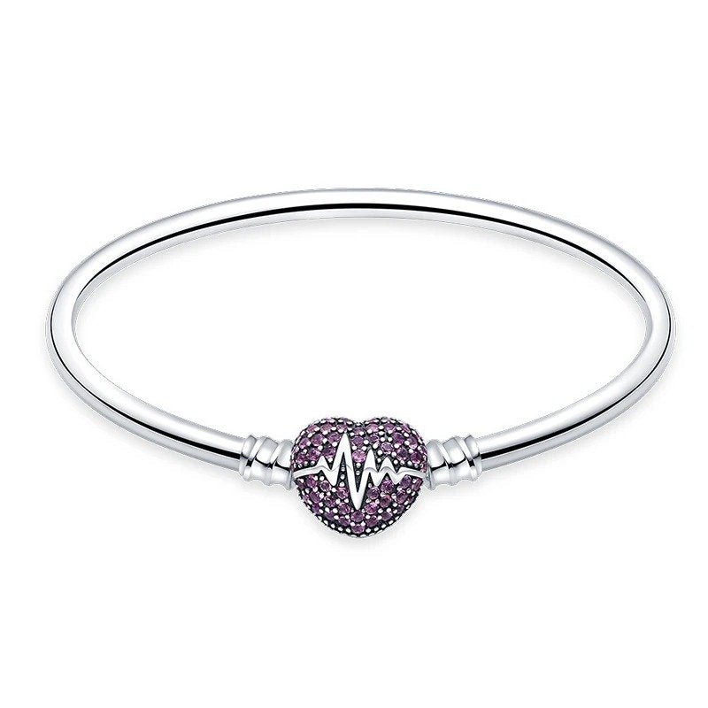 Heartbeat Pulse Sterling Silver Charm Bracelet with heartbeat pulse heart charm.