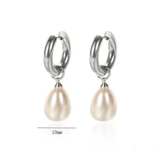 Silver hoop earbands with teardrop pearl measuband mm in height and mm in width.