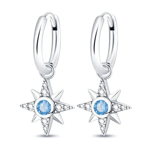 Sterling Silver North Star Drop Earrings - Sterling silver North Star drop earrings with blue cubic zirconia stones.