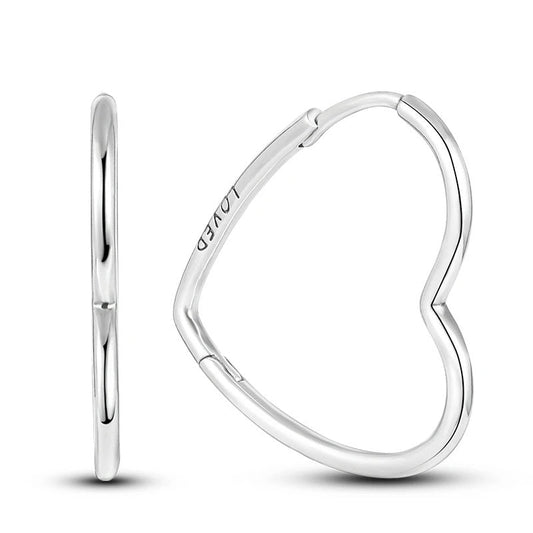 Sterling silver hoop earrings with open heart design.