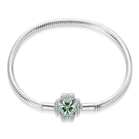 Lucky Clover Sterling Silver Snake Chain Charm Bracelet - Sterling silver snake chain bracelet with clover clasp, green enamel, and crystals.