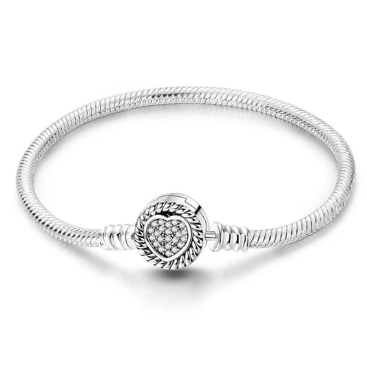 Twinkling heart charm sterling silver snake chain bracelet with cubic zirconia and rope design