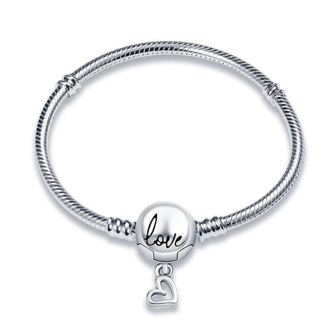 Love Heart Charm Sterling Silver Bracelet - Sterling silver bracelet with a round charm engraved with "Love" and a dangling heart.