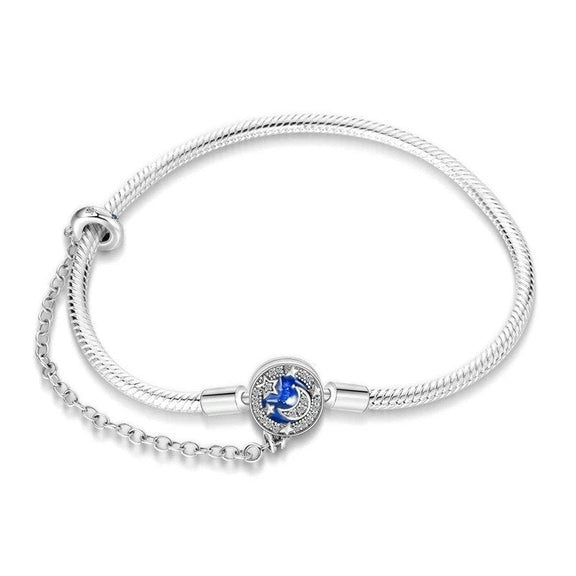 Enchanting Moon and Star Charm Bracelet - Enchanting Moon and Star Charm Bracelet in sterling silver.